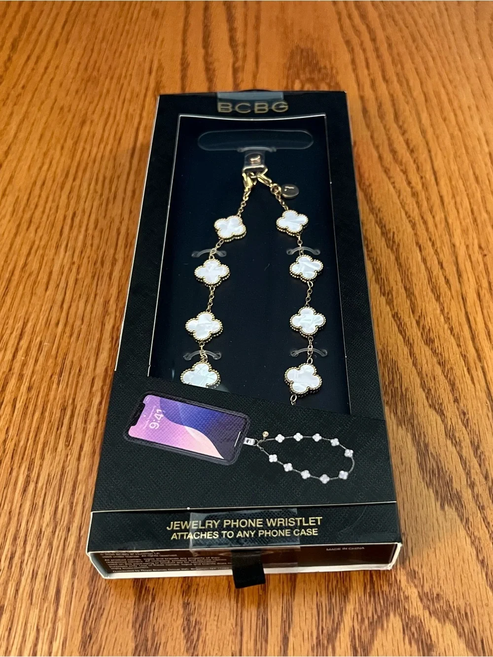 BCBG Gold-Tone Wristlet with White Clover Charms